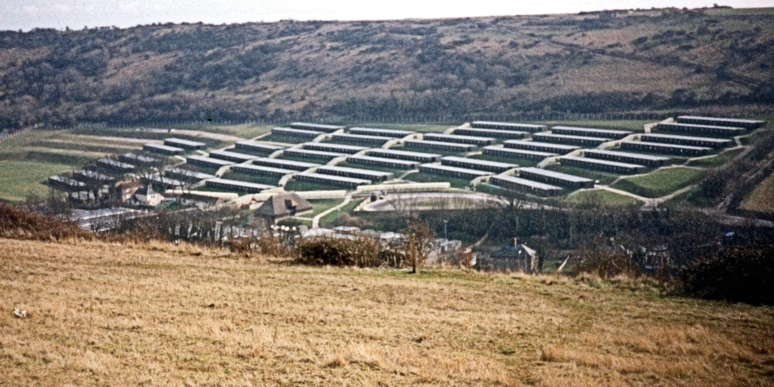 Adit A1 Channel Tunnel. Photograph taken during the initial construction phase of the Channel Tunnel at Shakespeare Cliff, Dover in 1988. Two engineers carrying out inspection of spoil conveyor in Adit A1. Attribution: Copyright Jeff Lewis and licensed for reuse under CC BY-SA 2.0 source A landscape